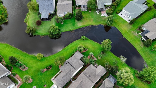 bird's eye view with a water view