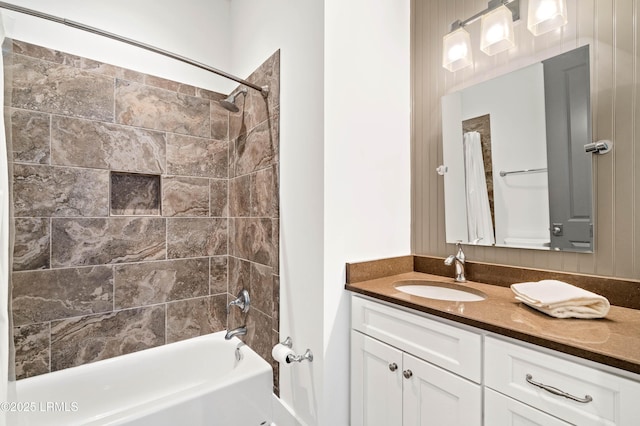 bathroom featuring shower / washtub combination and vanity