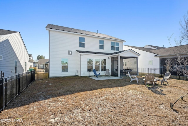 rear view of house featuring a patio