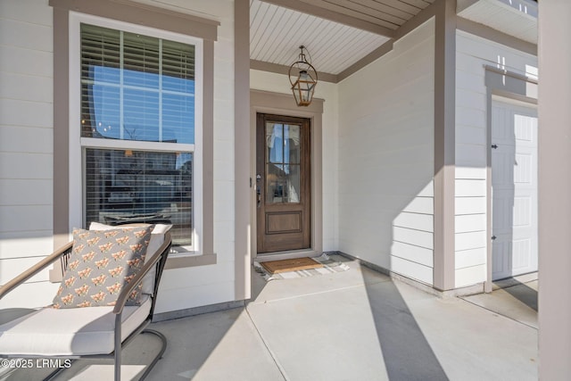 property entrance featuring covered porch