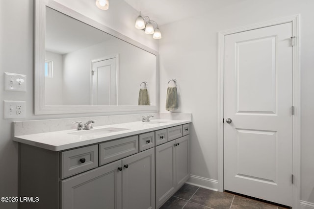 bathroom with vanity and tile patterned flooring