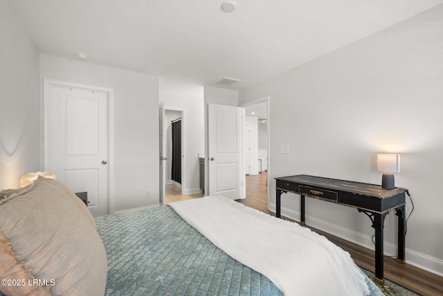 bedroom featuring hardwood / wood-style flooring