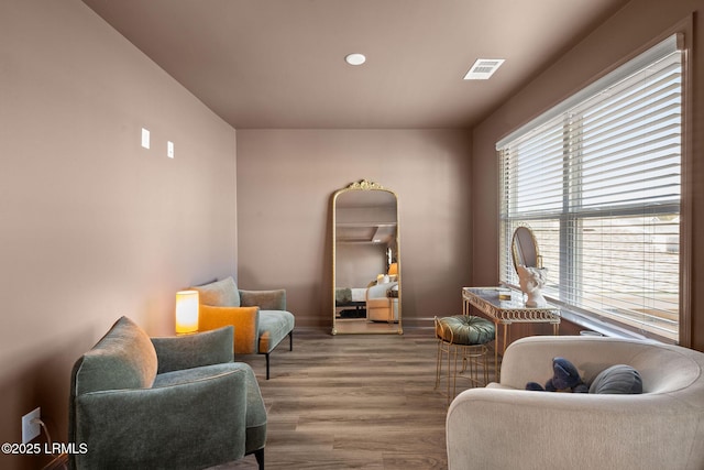 living area featuring hardwood / wood-style flooring