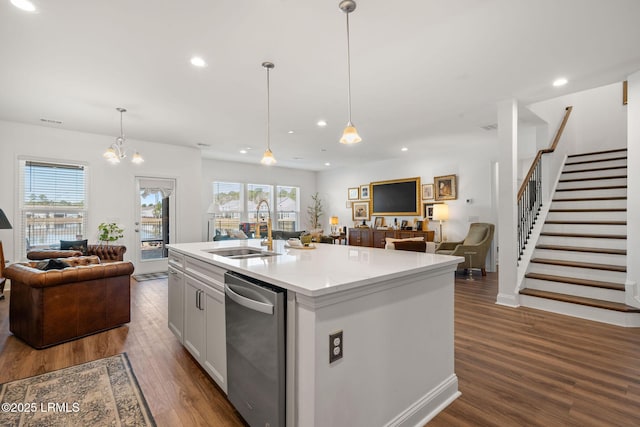 kitchen featuring a sink, open floor plan, recessed lighting, dishwasher, and dark wood-style flooring