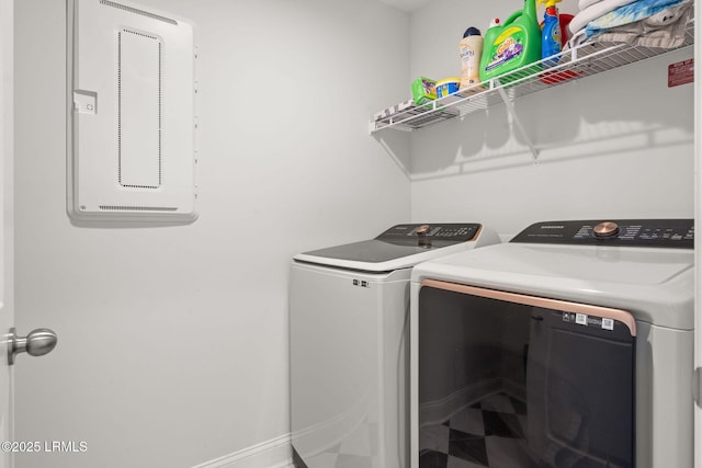 clothes washing area with laundry area and washing machine and dryer