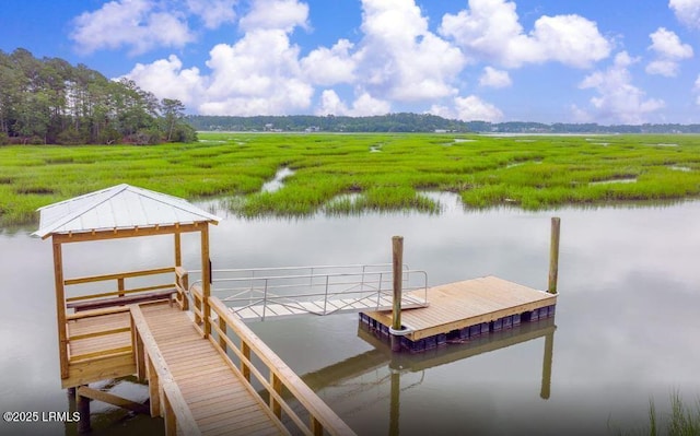 dock area with a water view and a rural view