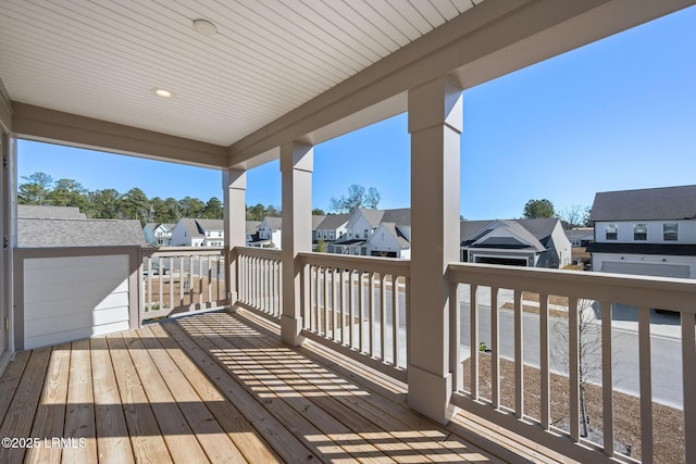 wooden terrace featuring a residential view