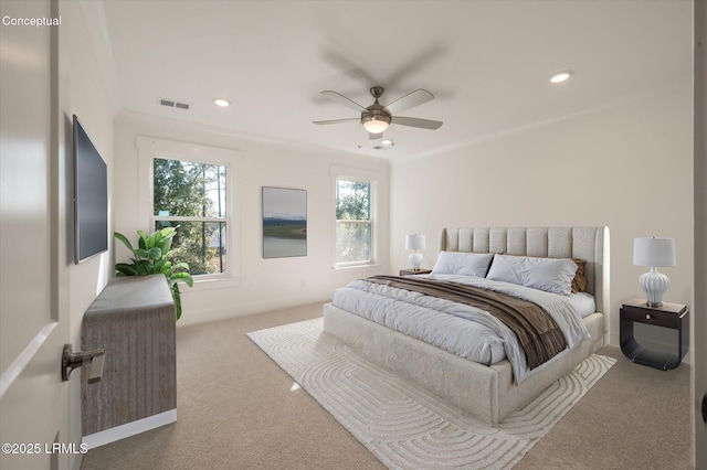 419 Parkside Commons, Bluffton, SC 29910 - carpeted bedroom with multiple windows, recessed lighting, ceiling fan, and crown molding
