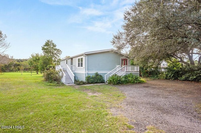 exterior space featuring a front yard