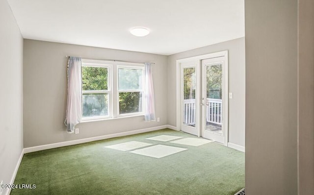 unfurnished room featuring carpet flooring