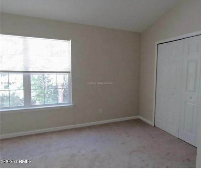 107 S St, Bluffton, SC 29910 - unfurnished bedroom featuring carpet and a closet