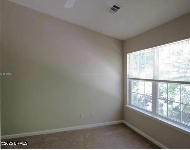 107 S St, Bluffton, SC 29910 - unfurnished room featuring carpet flooring and baseboards