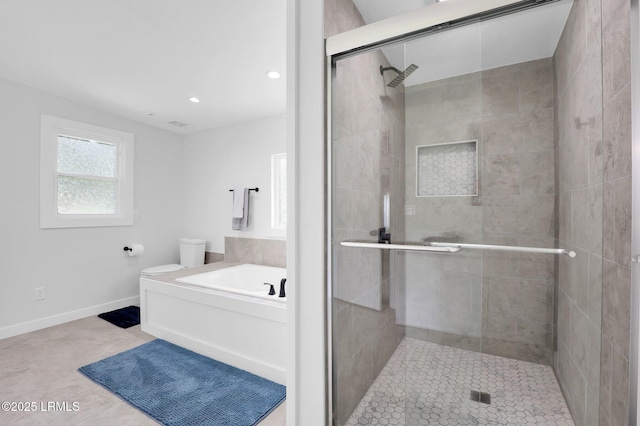 full bathroom featuring a stall shower, baseboards, toilet, recessed lighting, and a garden tub