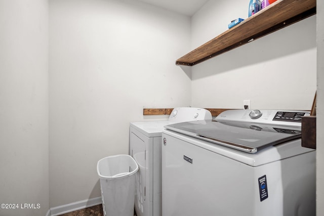 clothes washing area with independent washer and dryer