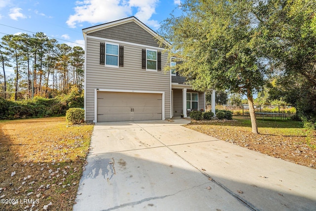 front of property featuring a garage