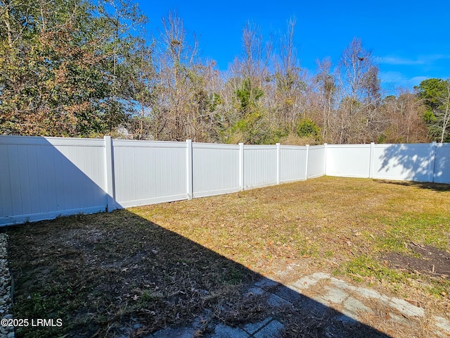 view of yard featuring a fenced backyard