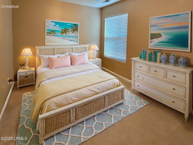 bedroom featuring baseboards, visible vents, and carpet flooring