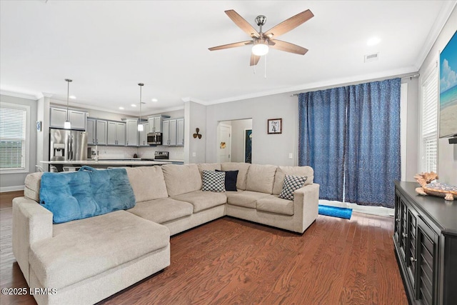 3614 Oyster Bluff Dr, Beaufort, SC 29907 - living room featuring visible vents, ornamental molding, a ceiling fan, dark wood-style floors, and baseboards