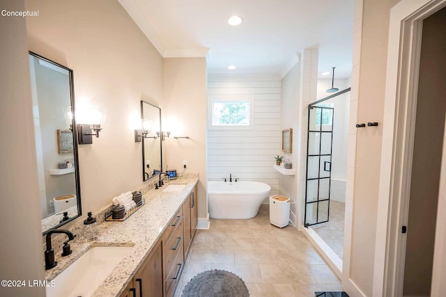 bathroom with ornamental molding, separate shower and tub, and vanity