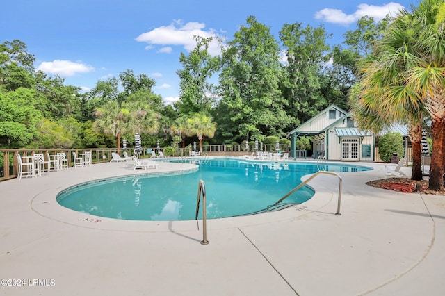 view of pool with a patio