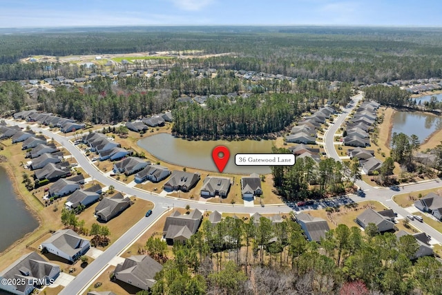 aerial view with a water view and a residential view