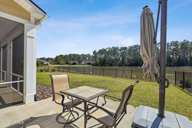 view of patio with outdoor dining area and a fenced backyard