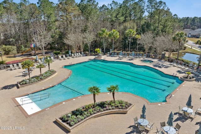 community pool with a patio