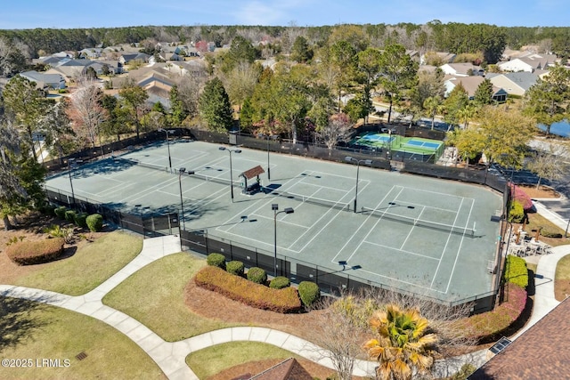 birds eye view of property with a residential view