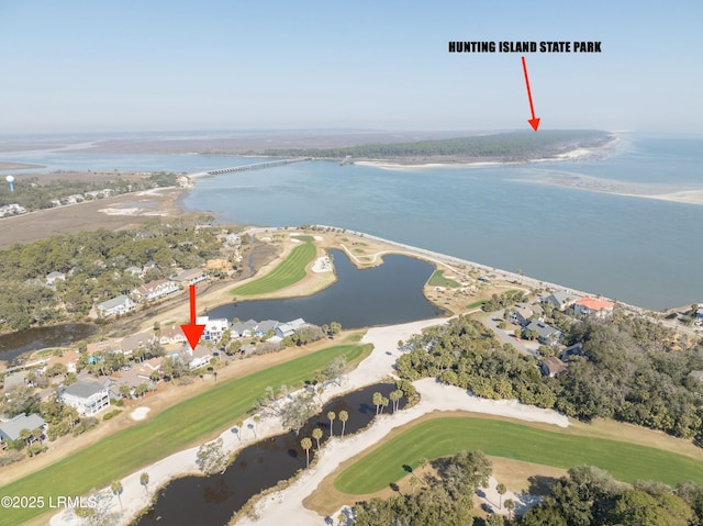 bird's eye view with a water view and golf course view