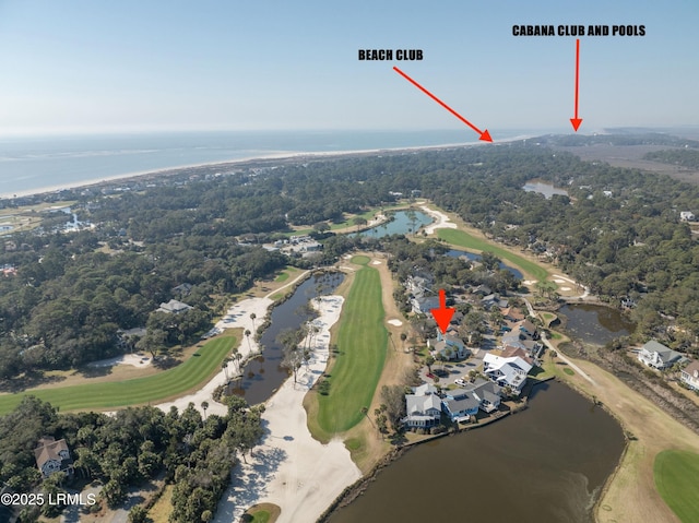 drone / aerial view featuring a water view and golf course view