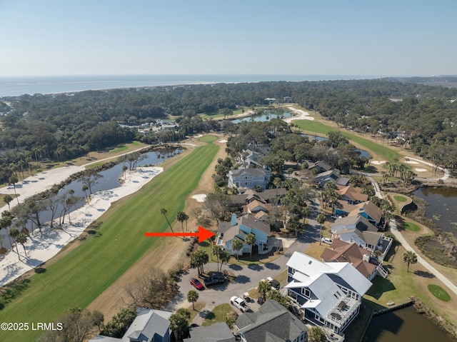 aerial view featuring view of golf course and a water view