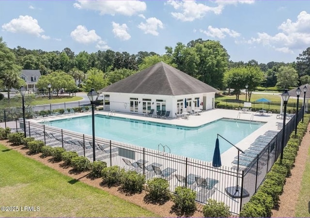 16 Wellington Dr, Bluffton, SC 29910 - pool featuring a patio, fence, and french doors