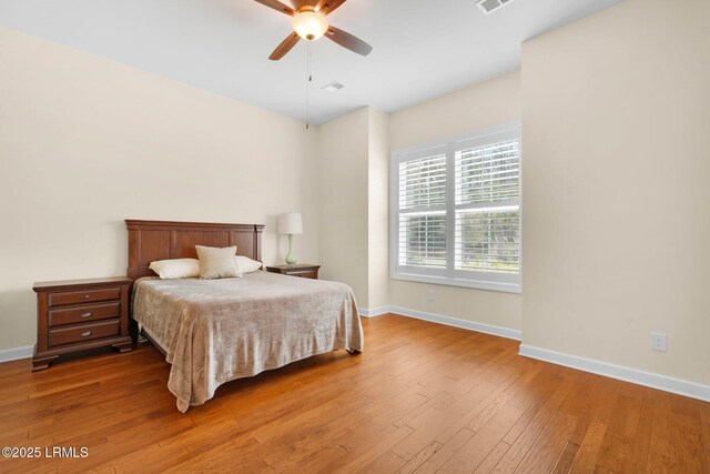 222 Hampton Lake Dr, Bluffton, SC 29910 - bedroom with baseboards, visible vents, ceiling fan, and hardwood / wood-style floors