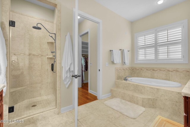 222 Hampton Lake Dr, Bluffton, SC 29910 - bathroom with vanity, tile patterned floors, a shower stall, and a garden tub