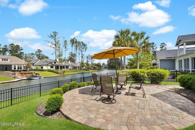 222 Hampton Lake Dr, Bluffton, SC 29910 - view of patio with a water view, a fenced backyard, and a residential view