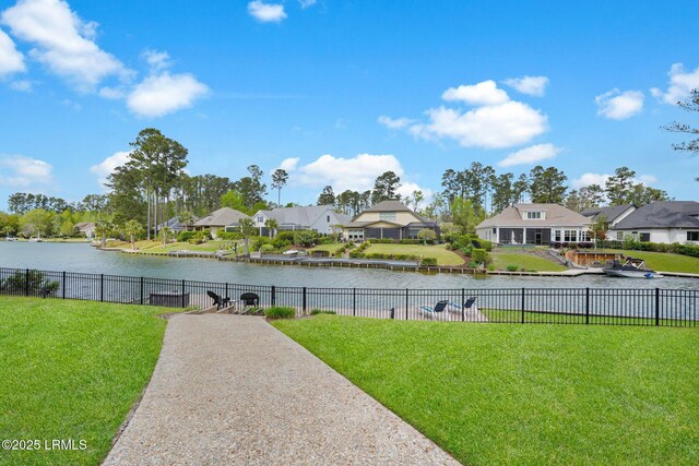 222 Hampton Lake Dr, Bluffton, SC 29910 - exterior space featuring fence, a yard, and a residential view