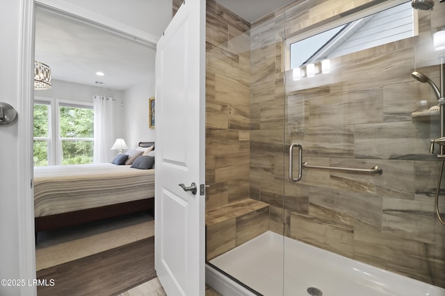 223 Rudder Run, Bluffton, SC 29910 - full bathroom featuring ensuite bathroom, a stall shower, and wood finished floors