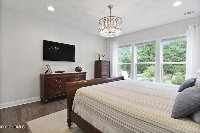 223 Rudder Run, Bluffton, SC 29910 - bedroom with dark wood-style floors, a chandelier, and recessed lighting