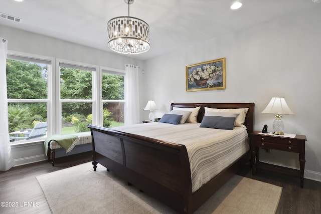 223 Rudder Run, Bluffton, SC 29910 - bedroom featuring multiple windows, a chandelier, wood finished floors, and recessed lighting