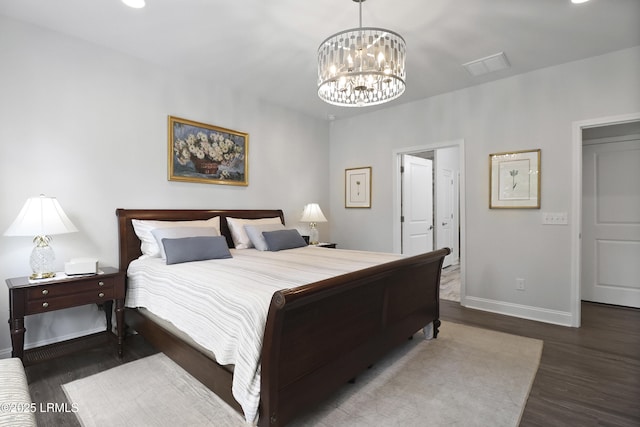 223 Rudder Run, Bluffton, SC 29910 - bedroom featuring wood finished floors and a chandelier