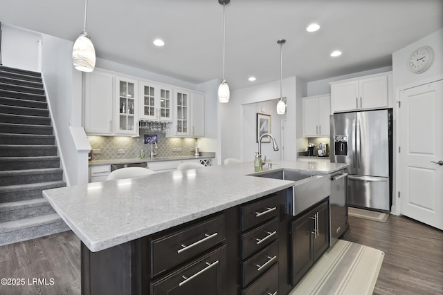 223 Rudder Run, Bluffton, SC 29910 - kitchen featuring stainless steel appliances, decorative backsplash, white cabinetry, dark wood-style floors, and recessed lighting