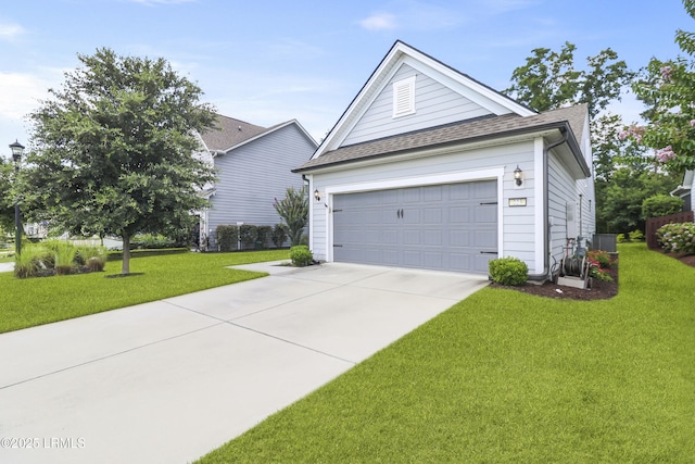 223 Rudder Run, Bluffton, SC 29910 - view of front of property featuring a shingled roof, driveway, a front lawn, and a garage