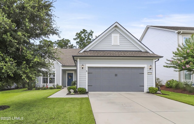223 Rudder Run, Bluffton, SC 29910 - traditional home featuring a shingled roof, driveway, a front lawn, and a garage