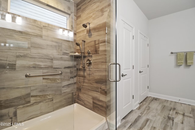 223 Rudder Run, Bluffton, SC 29910 - bathroom with a stall shower and baseboards