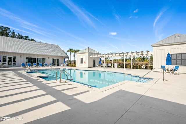 community pool with a pergola and a patio area