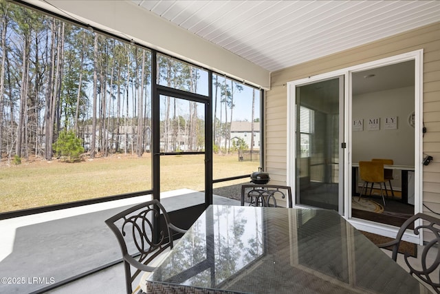 sunroom featuring wood ceiling