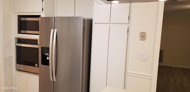 82 Sunset Blvd, Beaufort, SC 29907 - kitchen featuring stainless steel appliances, white cabinetry, and light countertops