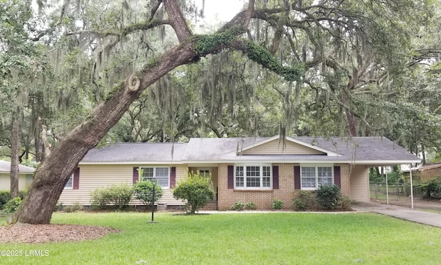 82 Sunset Blvd, Beaufort, SC 29907 - ranch-style home featuring an attached carport, concrete driveway, crawl space, and a shingled roof