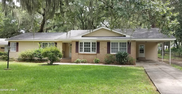 82 Sunset Blvd, Beaufort, SC 29907 - ranch-style home with a carport, driveway, and brick siding