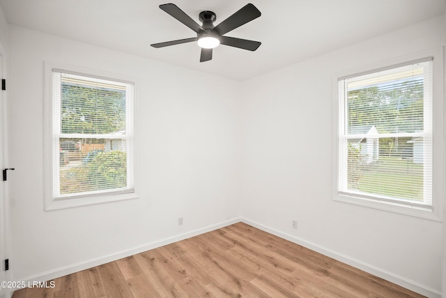 1117 Old Trail Rd, Beaufort, SC 29902 - unfurnished room with light wood-type flooring, plenty of natural light, and baseboards